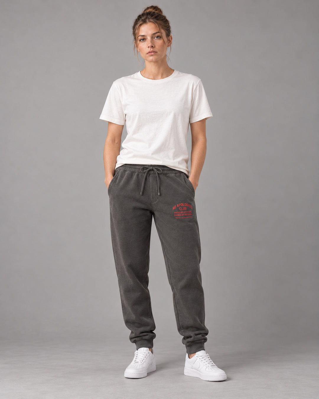 No Apologies pigment-dyed sweatpants in black, worn by a woman