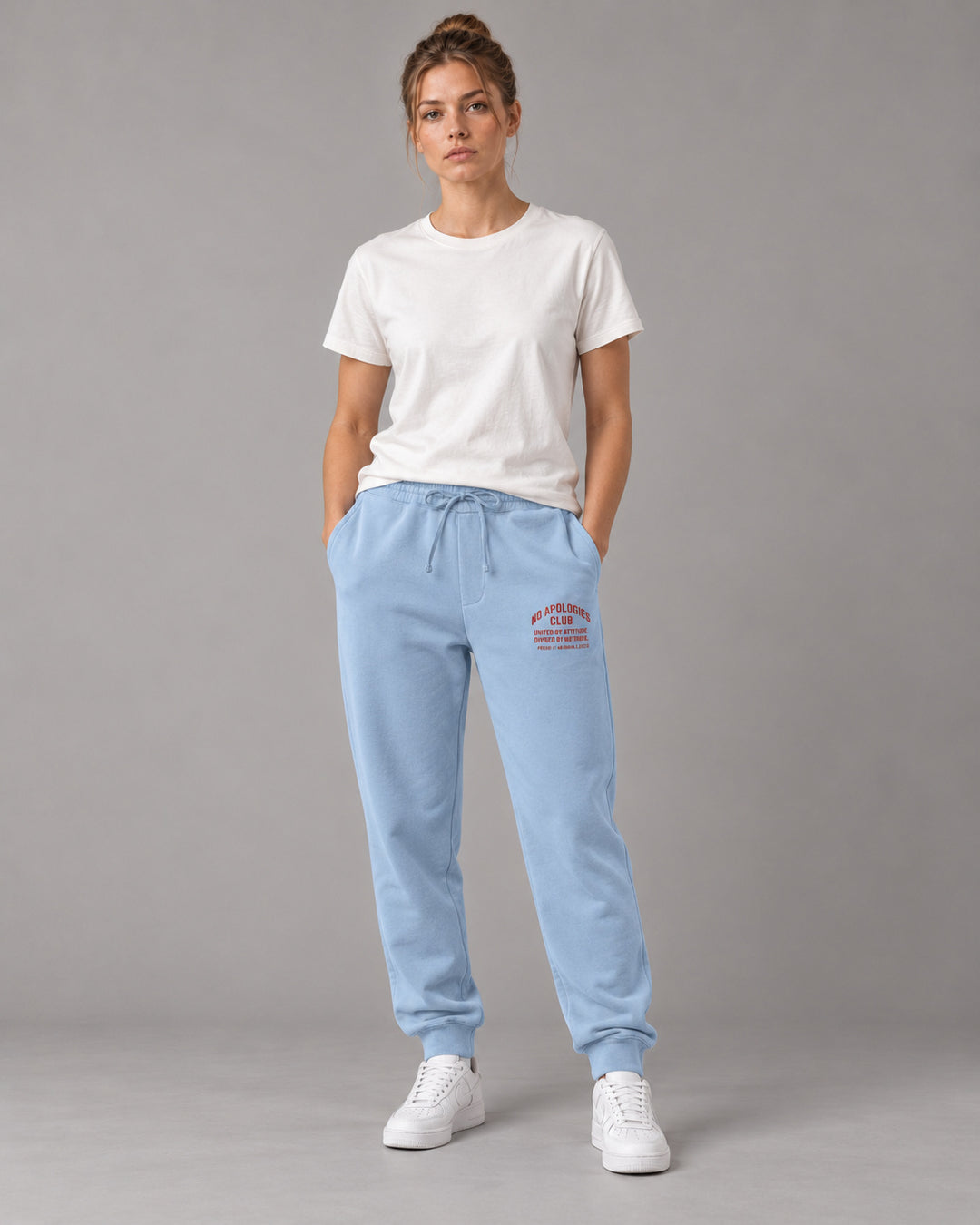 No Apologies pigment-dyed sweatpants in light blue, worn by a woman