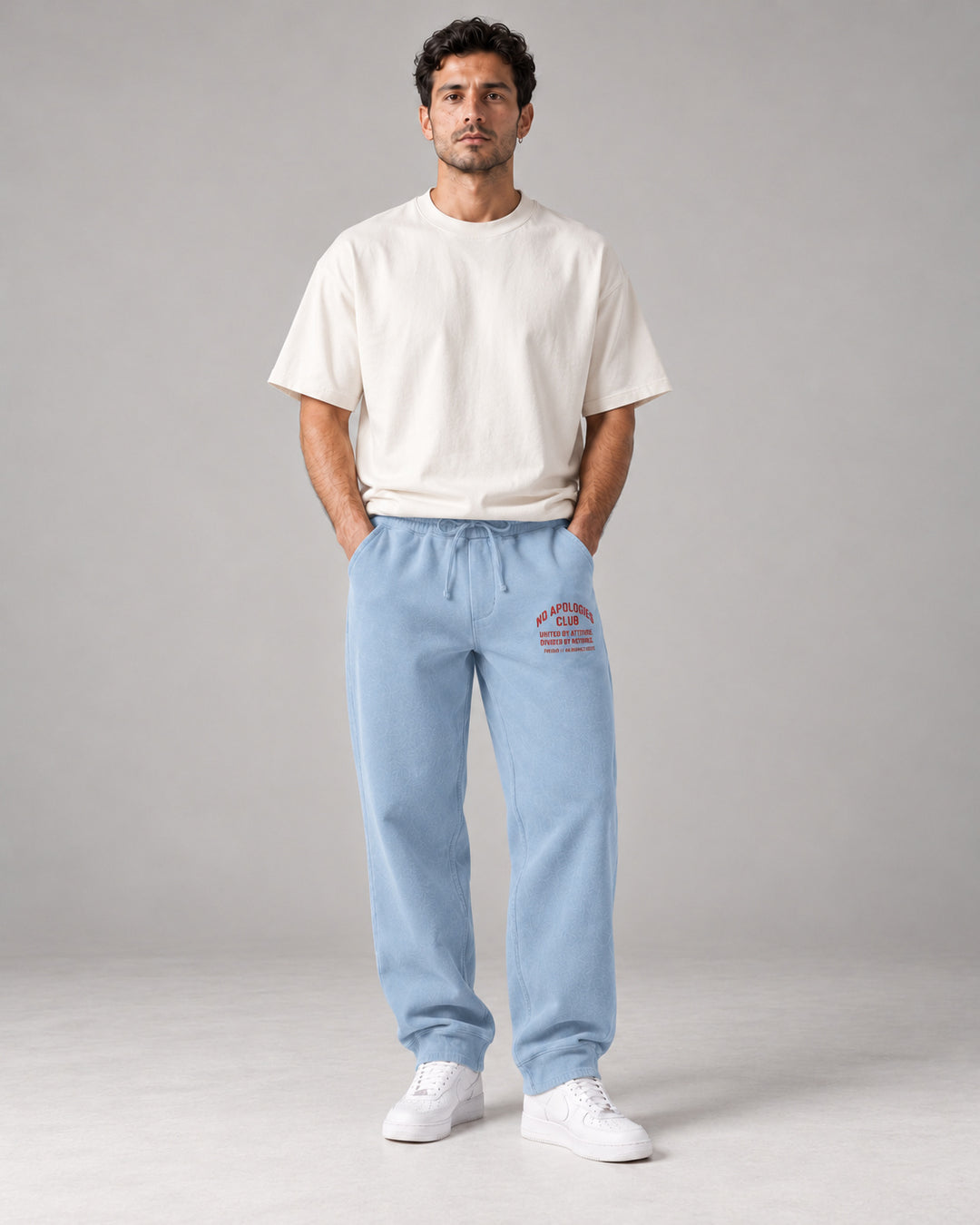 No Apologies pigment-dyed sweatpants in light blue, worn by a man