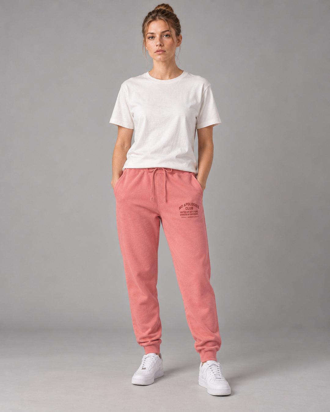 No Apologies pigment-dyed sweatpants in pink, worn by a woman
